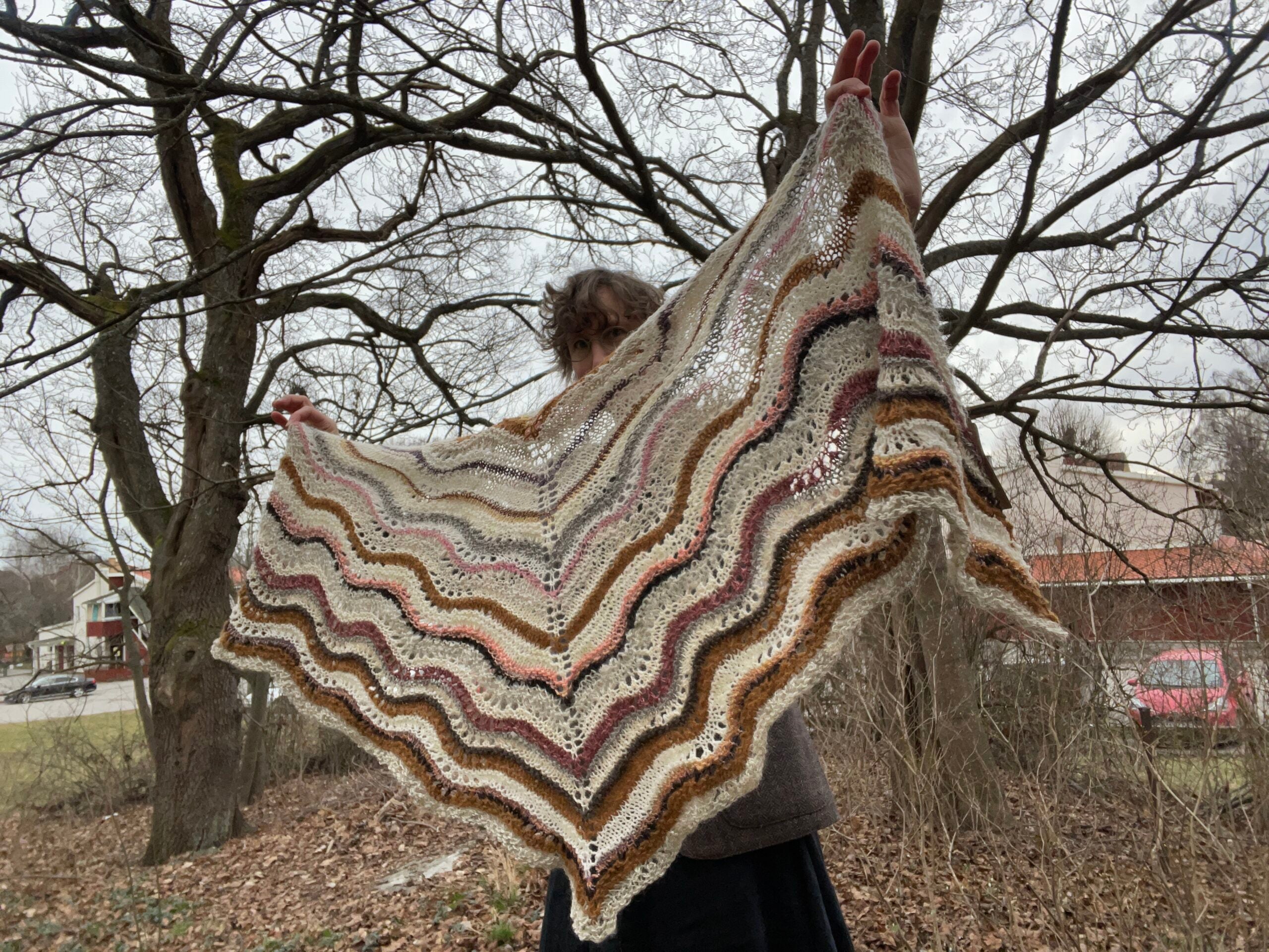 Lightweight shawl in ivory, ochre, and rose