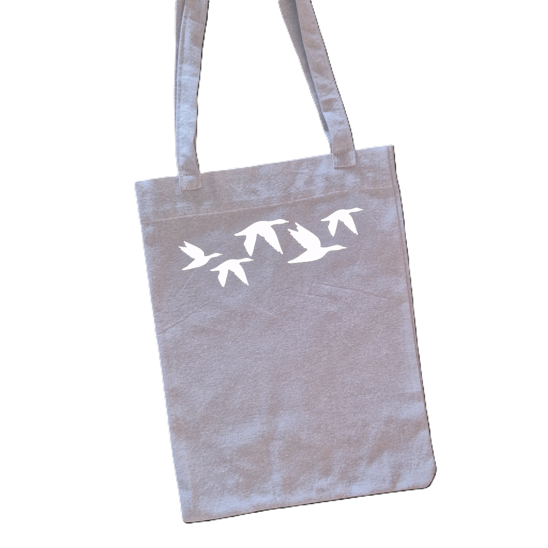 Tygväska med reflexmotiv