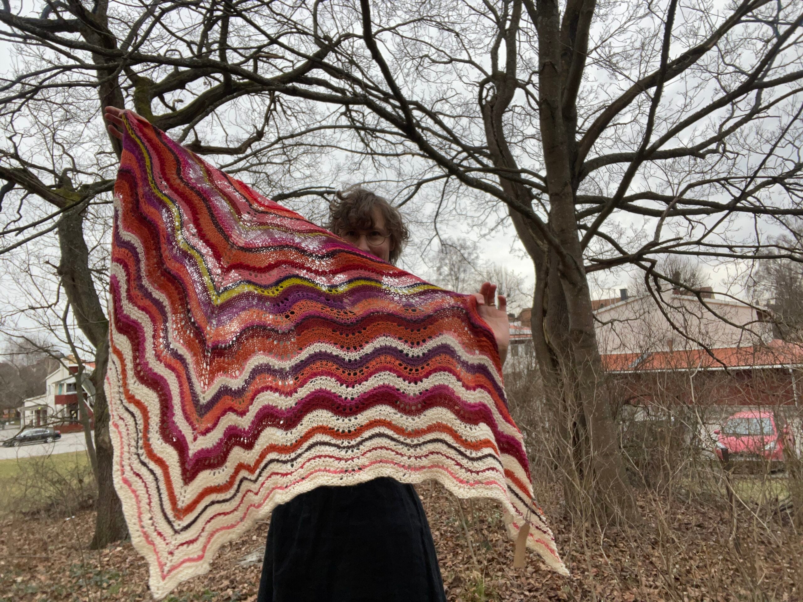 Lightweight shawl in white, fuschia, orange, and chartreuse