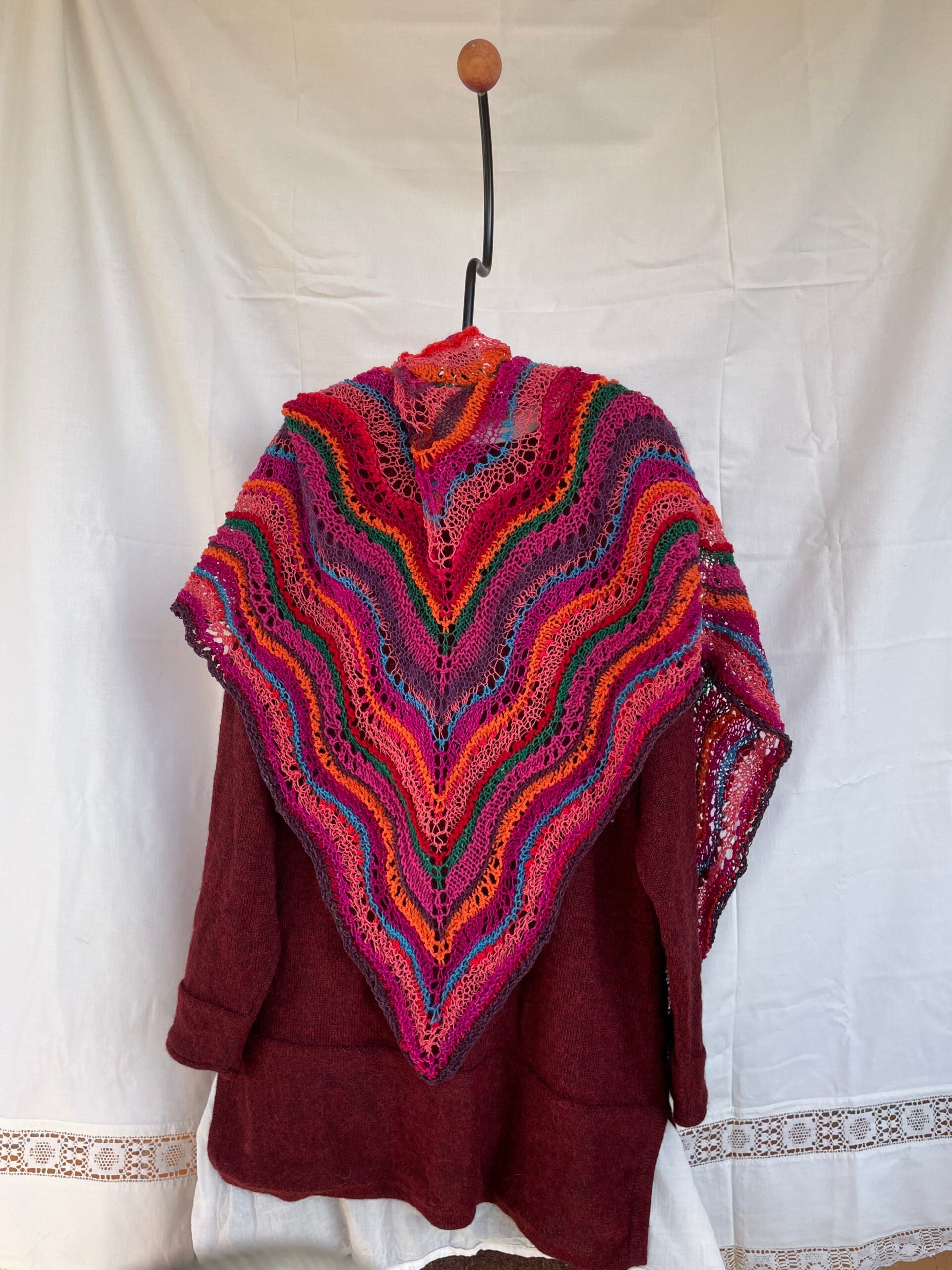Lightweight shawl in fuschia, orange, and turquoise