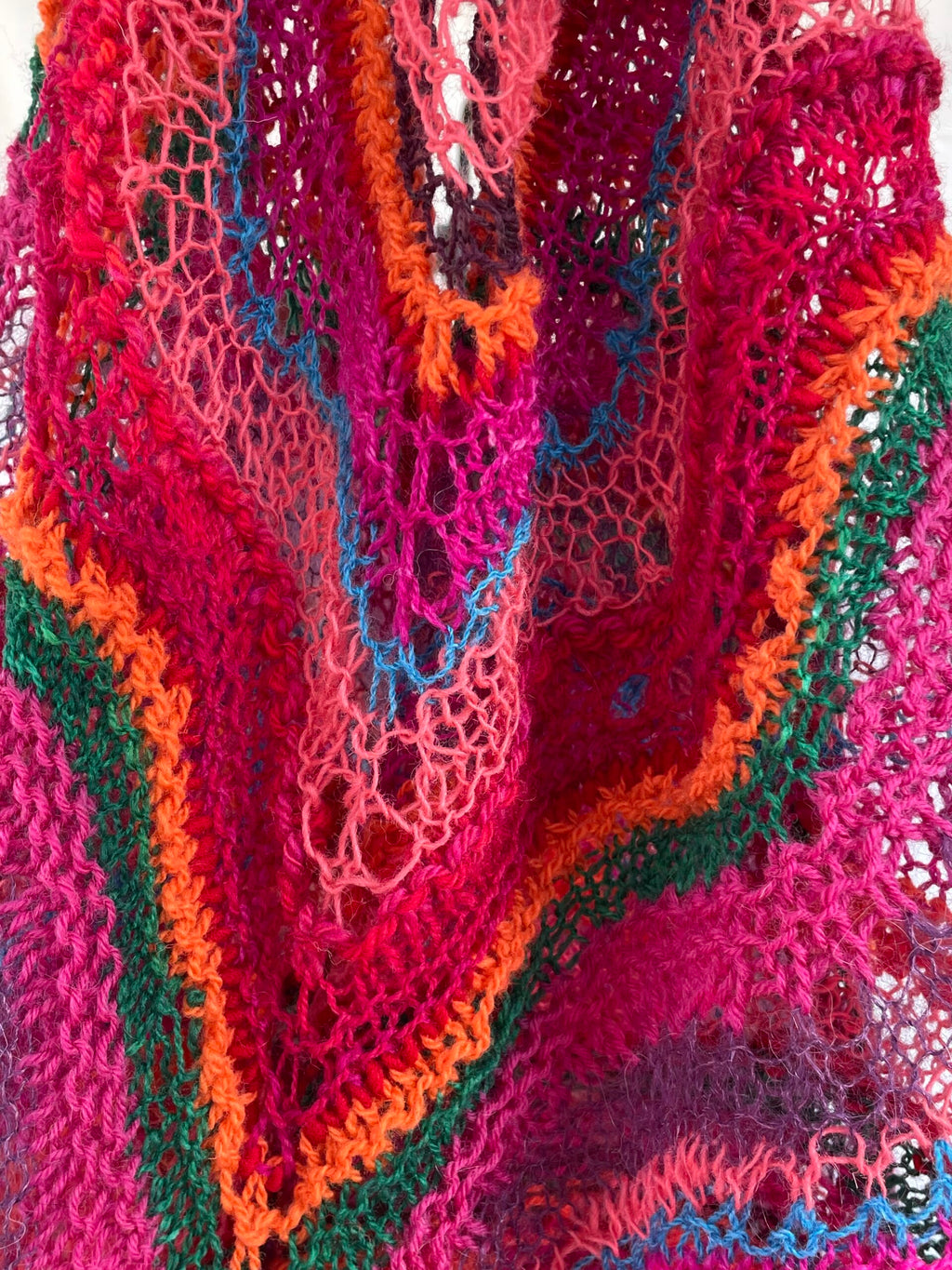Lightweight shawl in fuschia, orange, and turquoise
