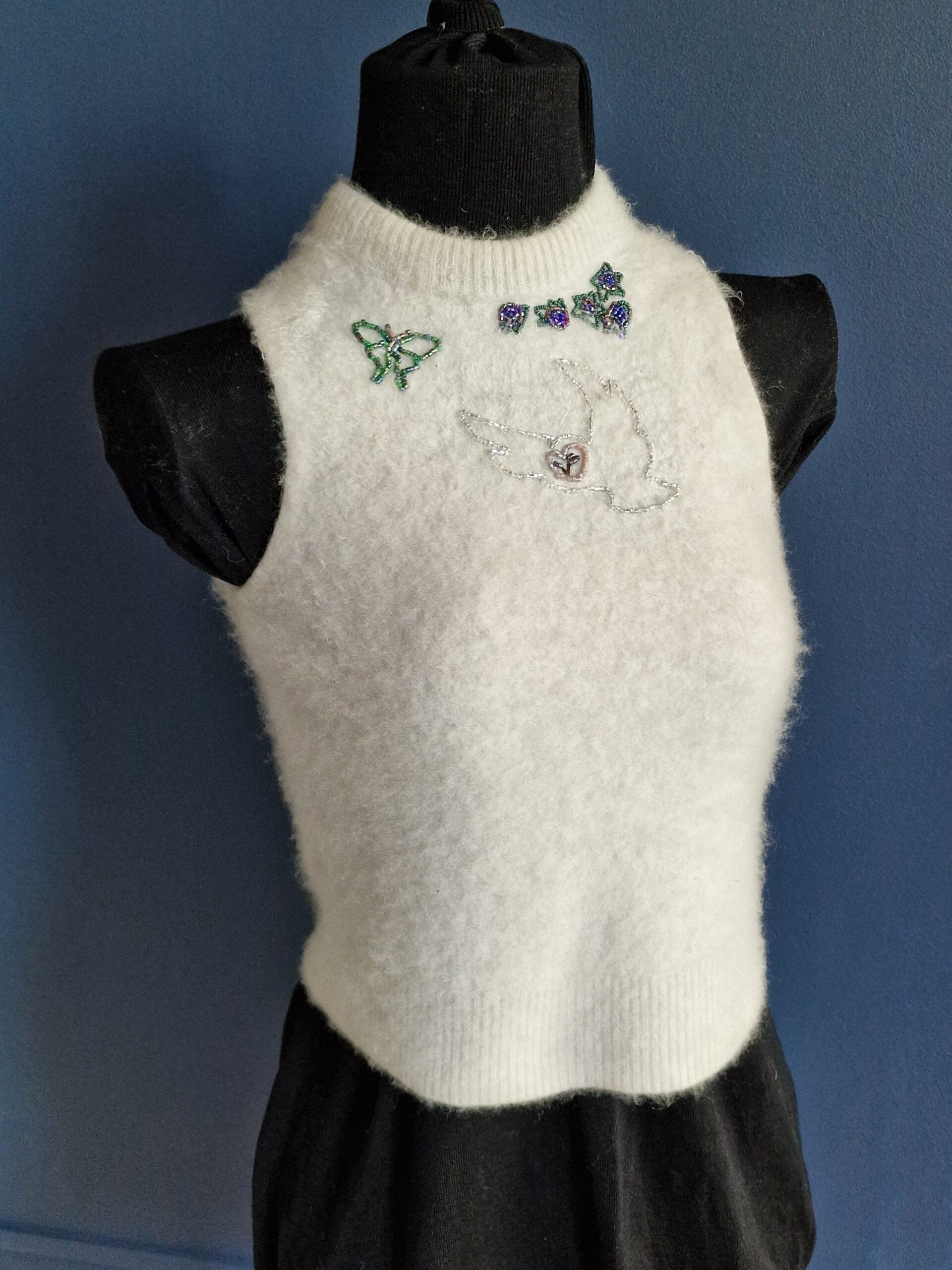 Embroidered white vest