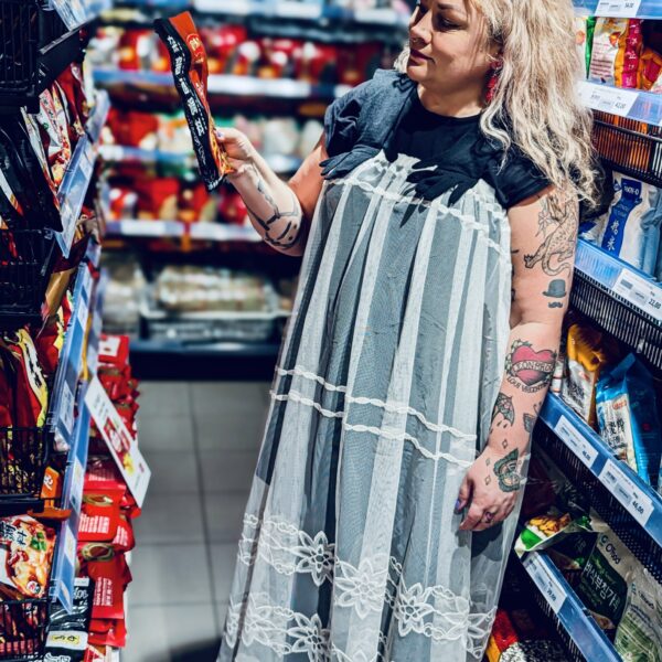 Hand on dress.