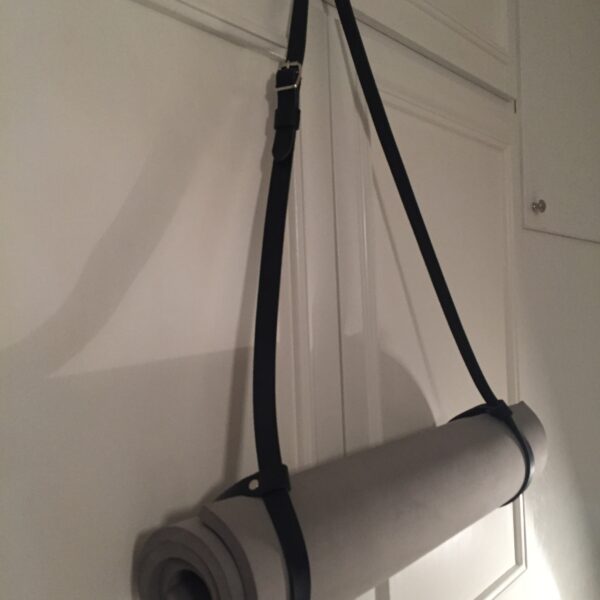 Black yoga mat holder