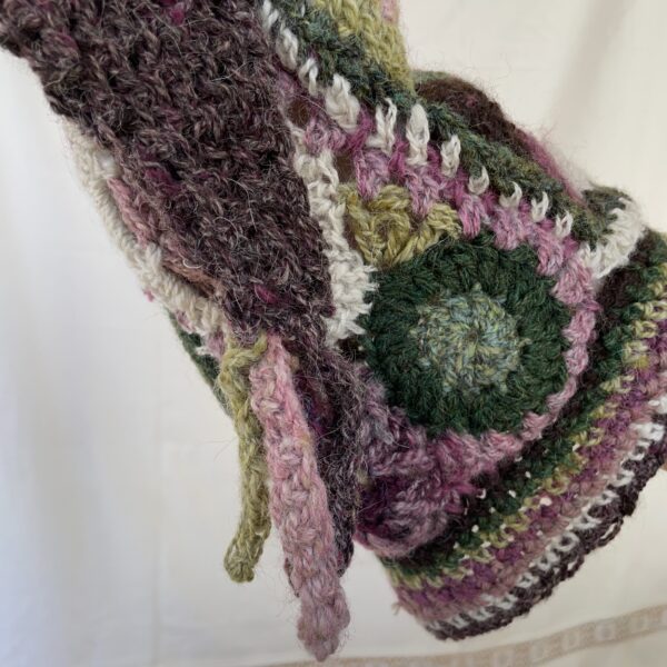 Heather, freeform crochet stocking cap with multicoloured tassel