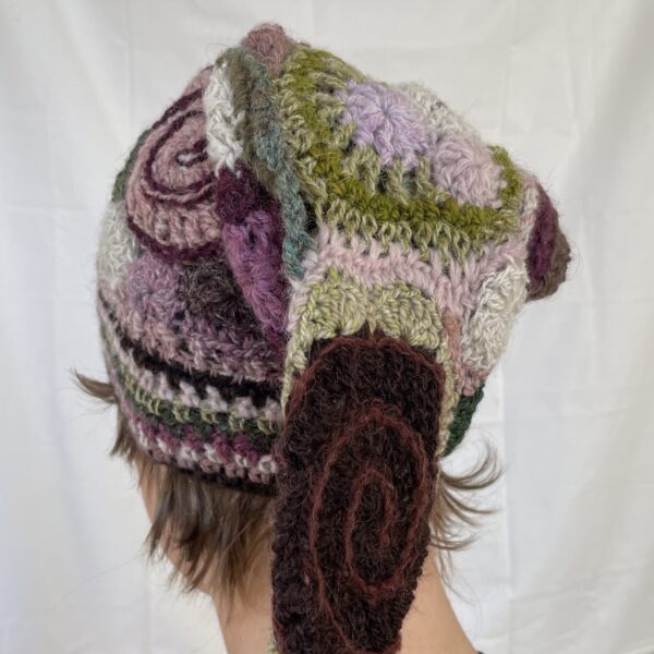 Heather, freeform crochet stocking cap with twisted tassel