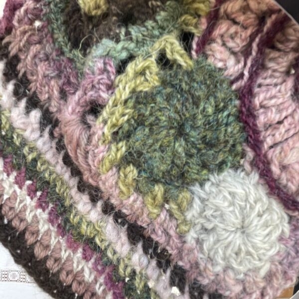 Heather, freeform crochet stocking cap with twisted tassel